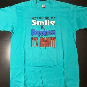 Vtg Screen Stars Sz XL "Don't Interpret This Smile As Happiness IT'S INSANITY"